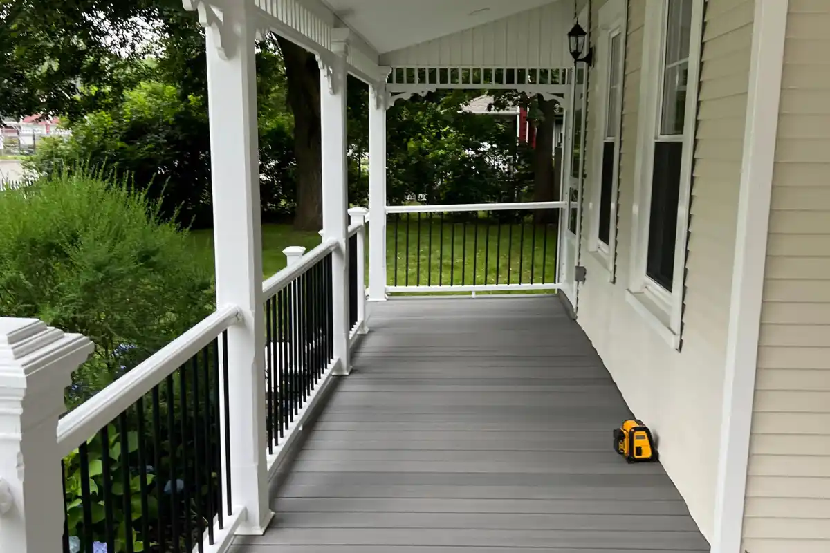 Completed porch renovation featuring custom deck design in Huntington Station by Ramos Quality Construction