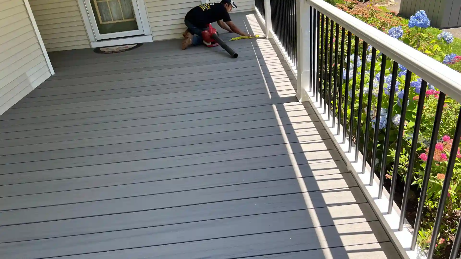 Expert carpenter working on deck restoration in Huntington Station