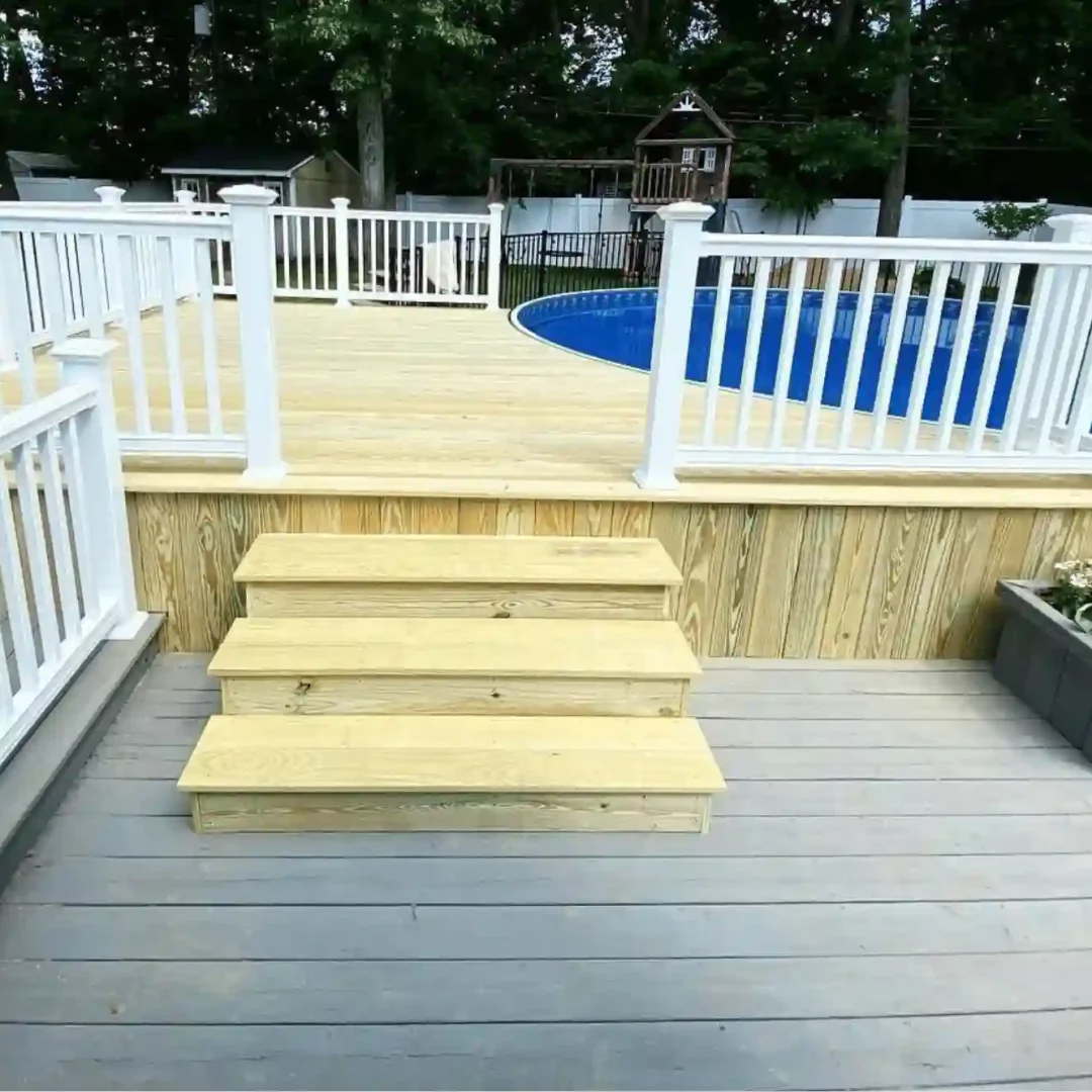 Custom-built pool deck with slip-resistant features in Huntington Station.